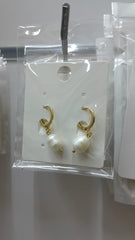 White pearl earring
