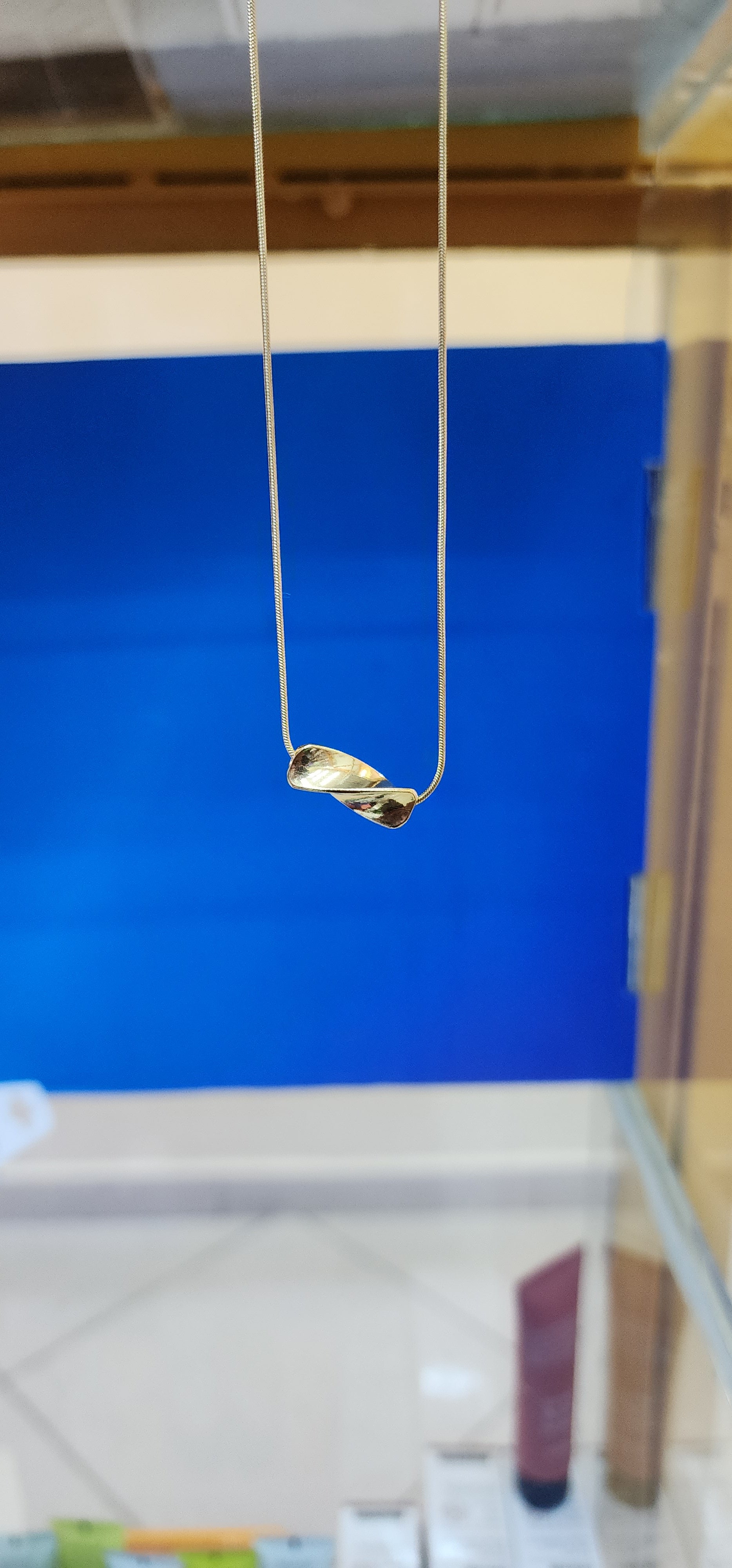 Golden radiance pendant necklaces