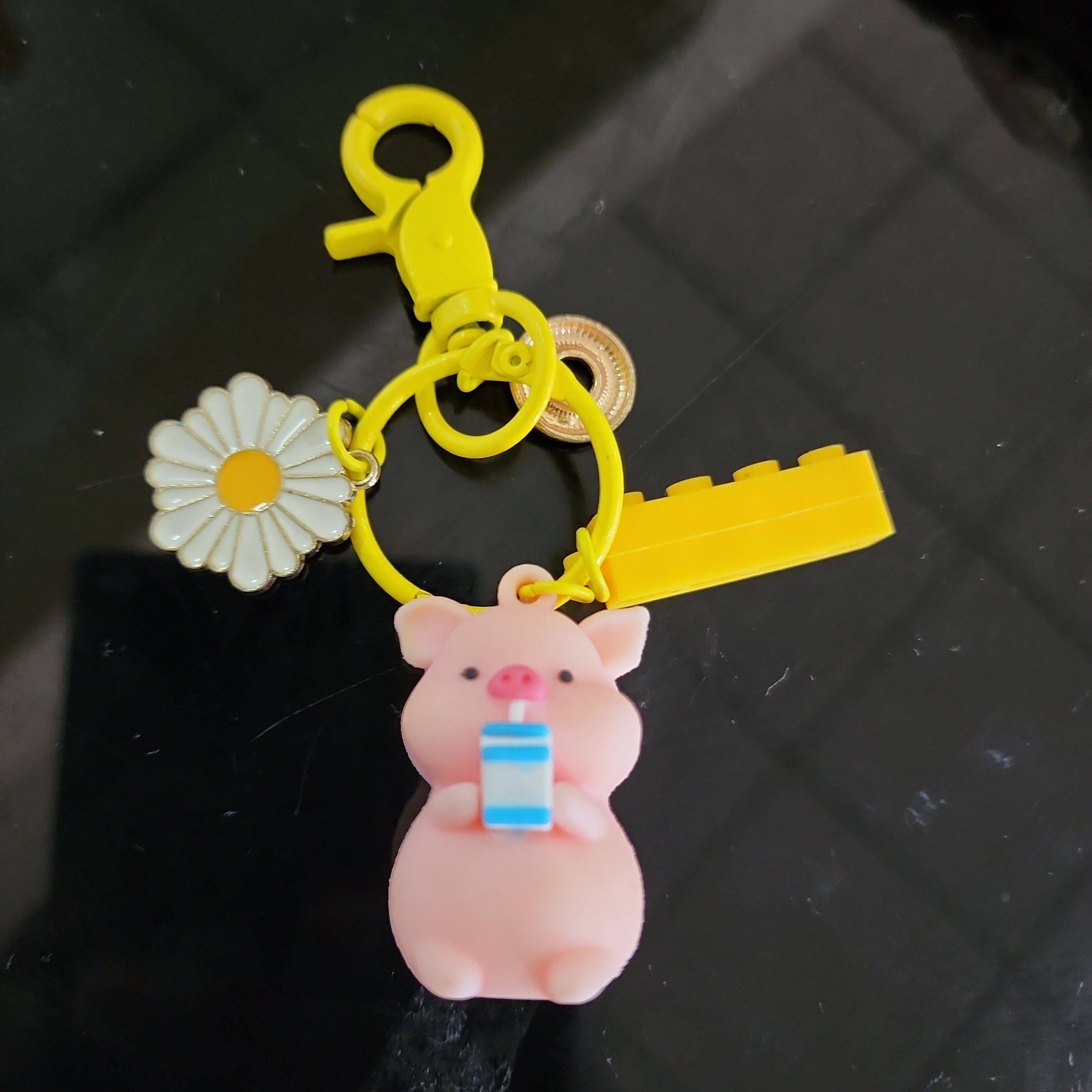 Pig key holder keychain with milk flower