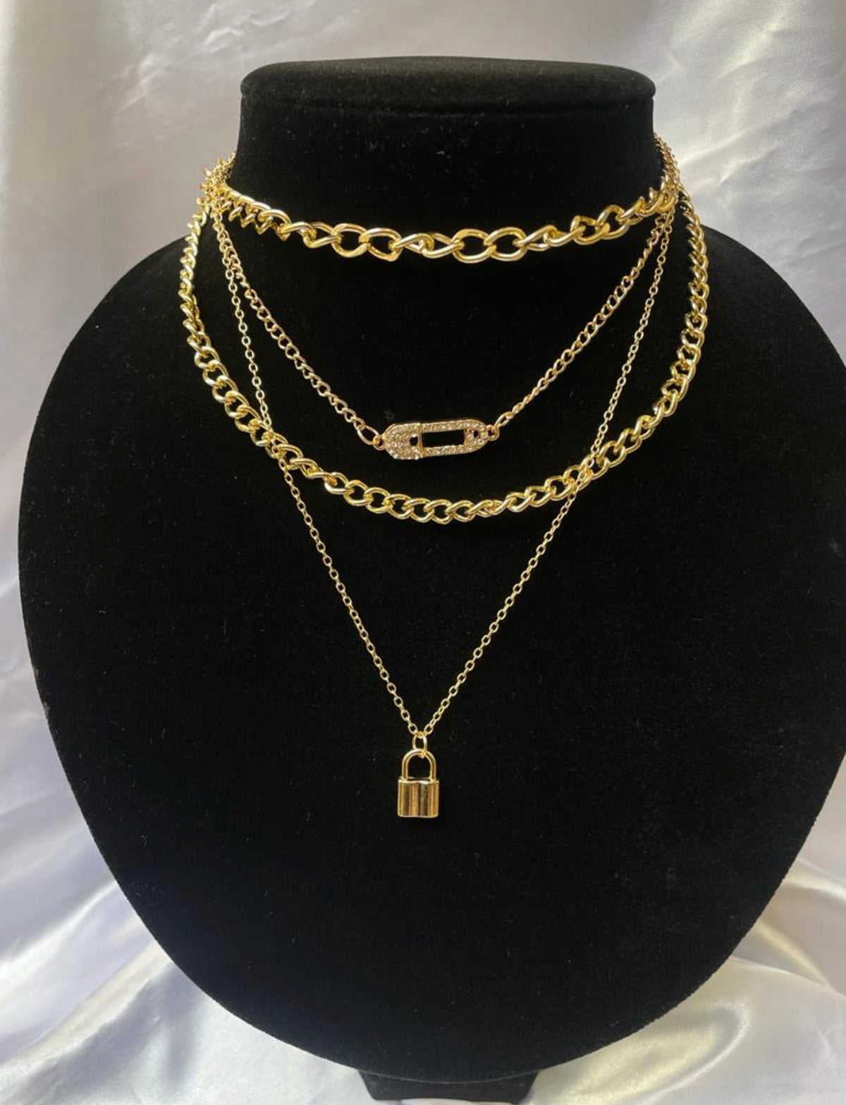 Ladies chains with shinny pin and padlock